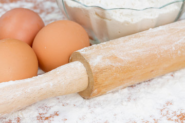 Flour, eggs and rolling pin