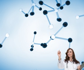 Happy doctor holding clipboard and pointing at 3d molecules