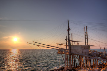 Fototapeta na wymiar Trabuccco o zachodzie słońca