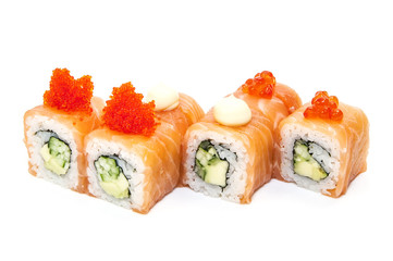 Japanese rolls in a restaurant with fish and vegetables