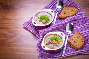 Mushroom soup with potato and croutons
