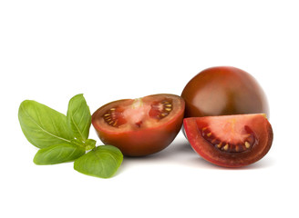 Tomato kumato and basil leaf