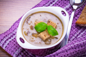 Mushroom soup with potato and croutons