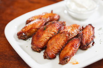 Chicken wings with sauce