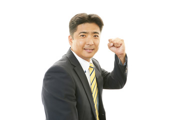ガッツポーズのビジネスマン