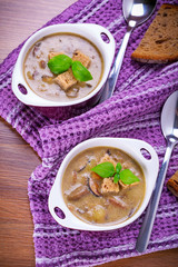 Mushroom soup with potato and croutons