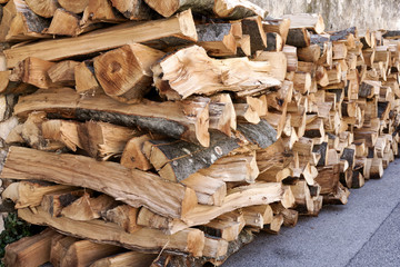 Pile of chopped fire wood prepared for winter