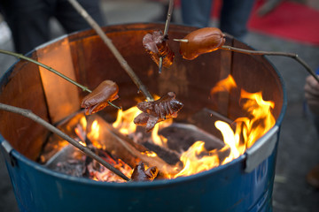 Fototapeta premium sausage fire from barrel roasted