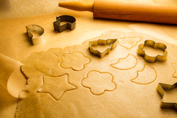 Prepare baking Christmas cookies made from gingerbread