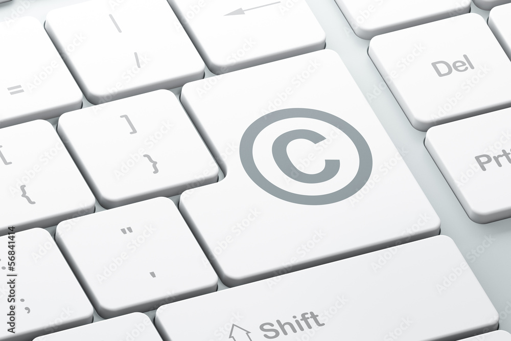 Poster law concept: copyright on computer keyboard background