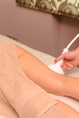Obraz na płótnie Canvas Therapy treatment of a thigh