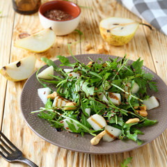fresh salad with pear and arugula