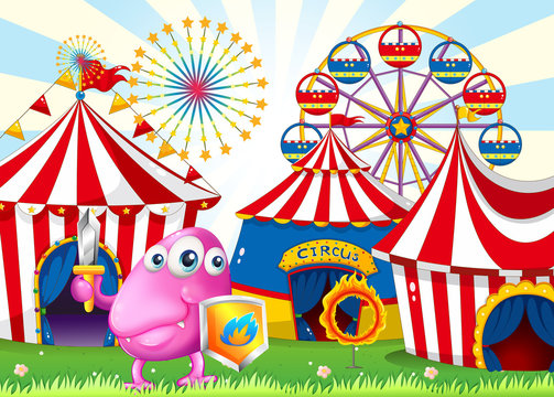 A carnival with a monster holding a shield and a sword