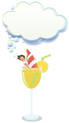A young girl enjoying above the glass of juice with an empty clo