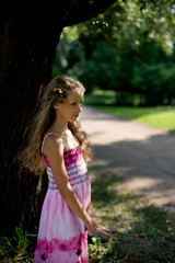 Little blonde girl in the park