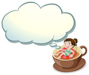 A girl enjoying inside the big cup