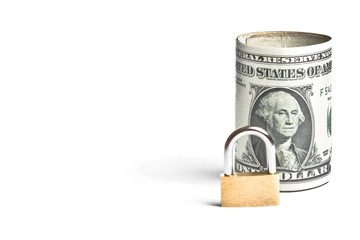 dollar banknote rolled near lock security on white background