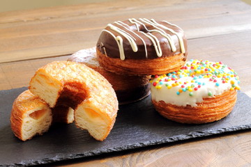Trendy puff pastries, half croissant and half donut