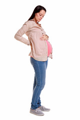 Pregnant woman looking at her bump
