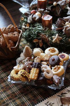 Beautiful Christmas cookies and candles on the table