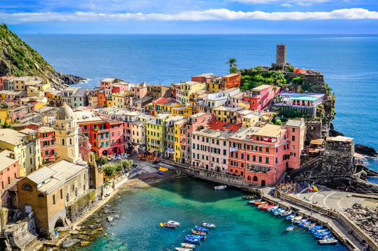 Scenic view of ocean and harbor in colorful village Vernazza