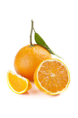 Ripe orange fruit with leaf isolated on white background