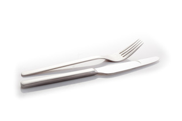 stainless knife and fork isolated on a white background