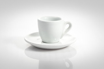 espresso cup with saucer isolated on a white background