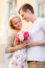 couple with flowers in the city