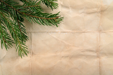 Beige paper background with Christmas tree