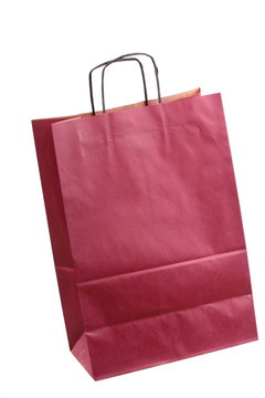 Shopping claret, claret-coloured gift bags and apple isolated