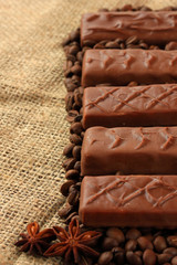 Delicious chocolate bars with coffee beans