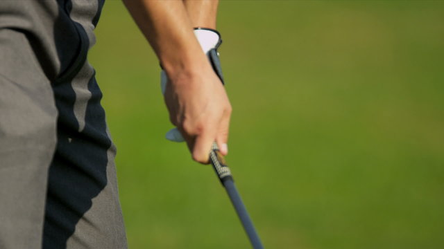 Close Up Gloved Hands Golfer Gripping Golf Club