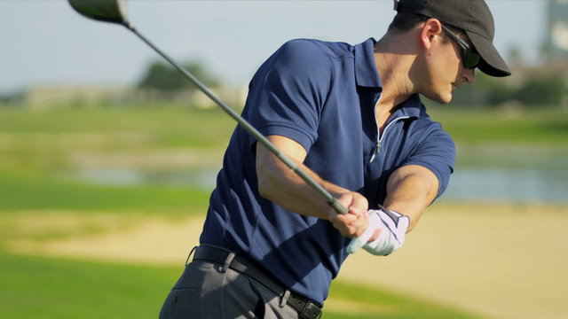 Professional Golfer Teeing Off Close Up