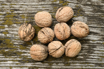 Walnuts  on wooden textured background