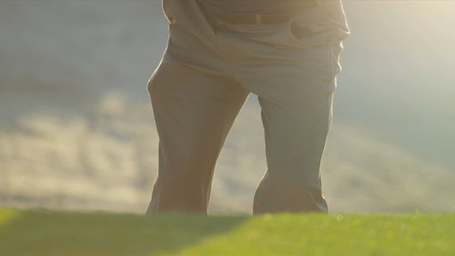 Golf Professional Playing Ball Sand Wedge