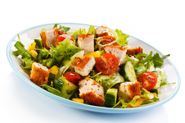 Fried chicken breast and vegetables