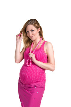 pregnant woman in pink dress