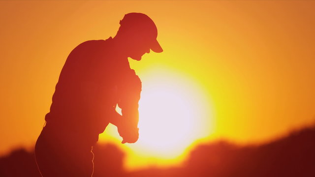 Close Up Male Caucasian Golfer Practicing Swing 