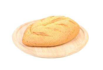 White bread on a wooden tray.