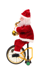 Santa Claus doll on a bike.