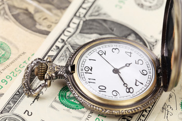 Pocket watch with financial assets.