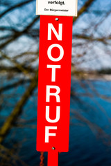 emergency sign with lettering