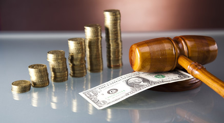 Wooden gavel and money,one dollar, dollar bank note