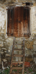 Steps Leading to Wooden Shutter