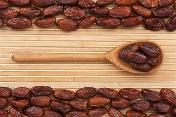 Wooden spoon with  dried  date
