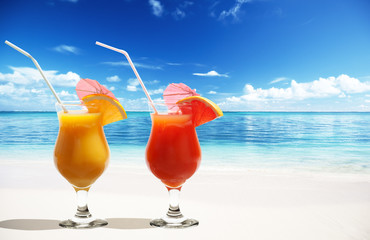 Two fresh juices on beach