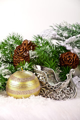 Christmas background with red bauble,snow and snowflakes 