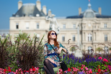 Fototapeta premium Redhead girl near Luxembourg Palace