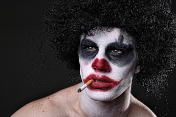 Spooky Clown Portrait on Black Background